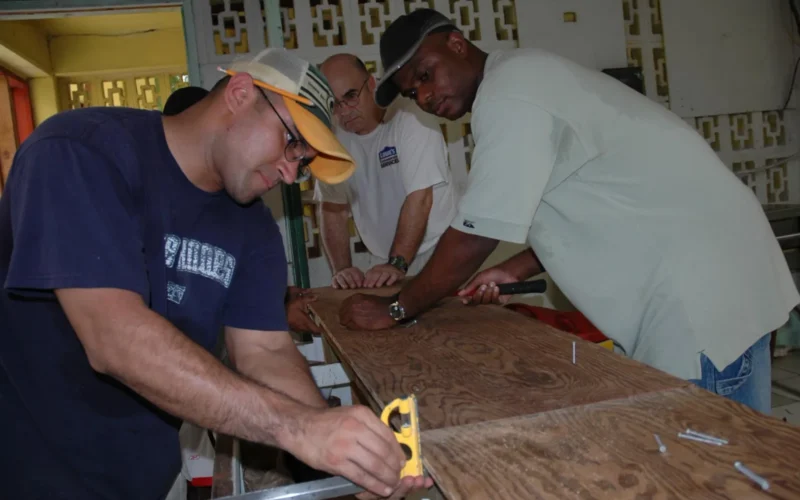 Majuro, Marshall Islands (Aug. 27, 2005) - Sailors assigned to the amphibious assault ship USS Boxer (LHD 4), install a kitchen counter in Assumption Catholic School during a community outreach project in Majuro, Marshall Islands. Boxer's visit to the island gave the Sailors and Marines a chance to conduct a community outreach program and experience Marshallese culture as well as provide some much-needed assistance in the form of medical aid, education, construction and repairs to schools and other buildings. U.S. Navy photo by Airman Noel Danseco (RELEASED)