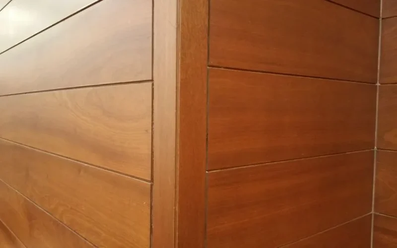 Close-up of modern wooden wall panels showcasing clean lines and texture.