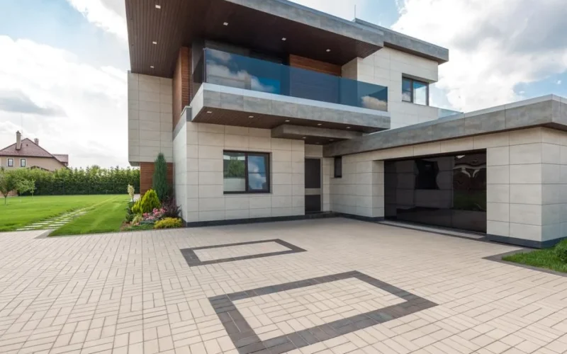 A stylish modern minimalist house exterior with clean lines and geometric shapes.