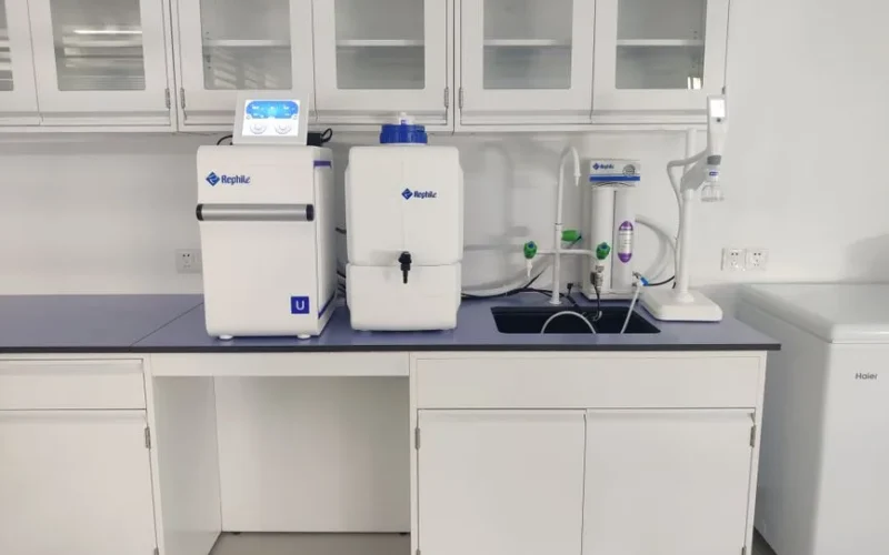 High-grade water purification system setup in a modern laboratory setting.